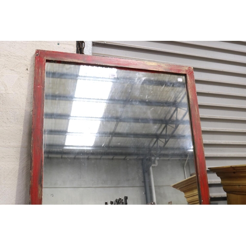 849 - Chinese red lacquer wall mirror, approx 132cm x 85cm