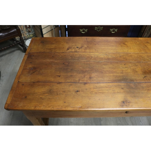 869 - Antique French fruitwood rustic farmhouse table, drawers to each end & centre, standing on stretcher... 