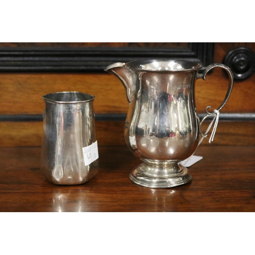 809 - Two hallmarked silver pieces, jug and a small vase, approx 10cm H & shorter & total approx 153 grams... 