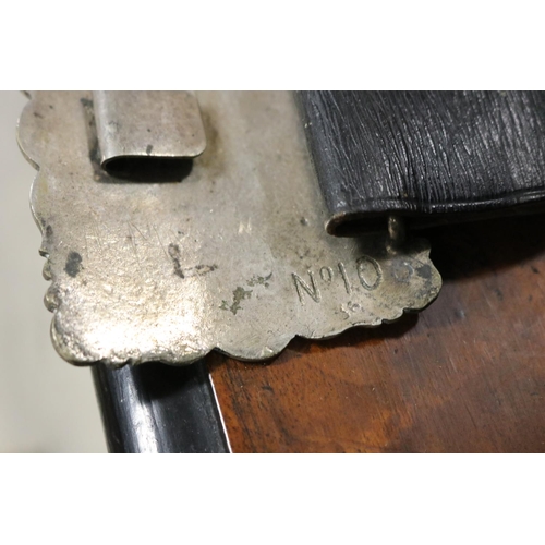 810 - Antique cast white metal belt buckle with original leather belt