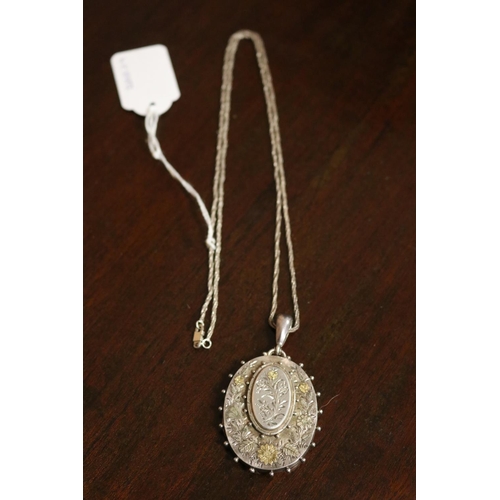 811 - Antique sterling silver locket Birmingham 1901-02, on a later silver chain