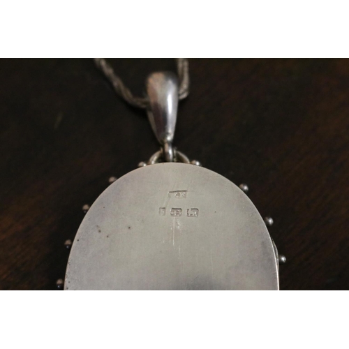 811 - Antique sterling silver locket Birmingham 1901-02, on a later silver chain
