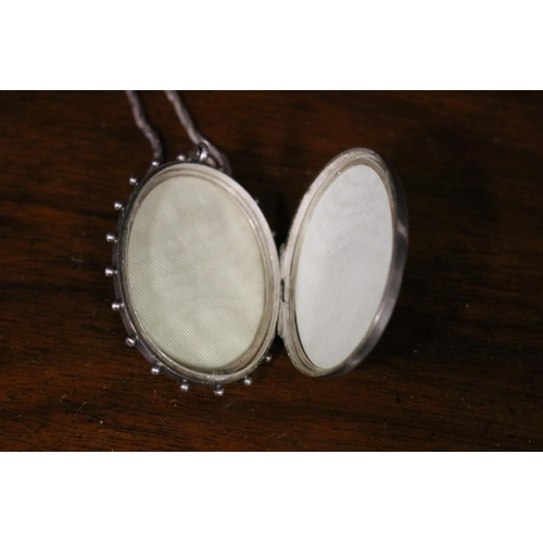 811 - Antique sterling silver locket Birmingham 1901-02, on a later silver chain