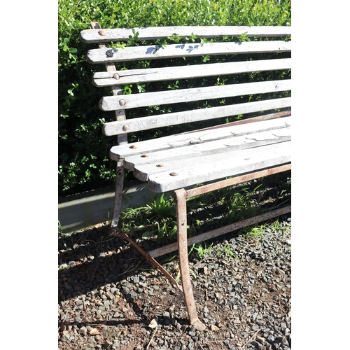 23 - Rustic garden bench with wooden slats and flat bar iron frame, approx 196cm W