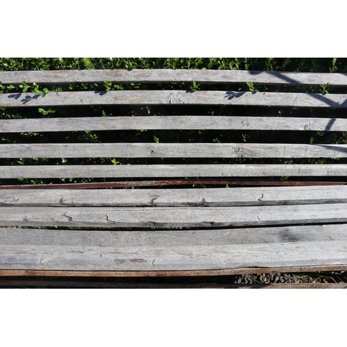 23 - Rustic garden bench with wooden slats and flat bar iron frame, approx 196cm W