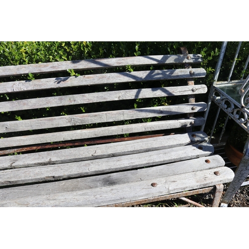 23 - Rustic garden bench with wooden slats and flat bar iron frame, approx 196cm W