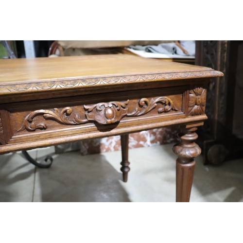 458 - Antique French Henri II oak two drawer desk, standing on turned fluted legs, approx 77cm H x 128cm W... 