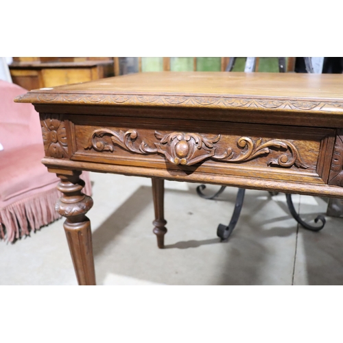 458 - Antique French Henri II oak two drawer desk, standing on turned fluted legs, approx 77cm H x 128cm W... 