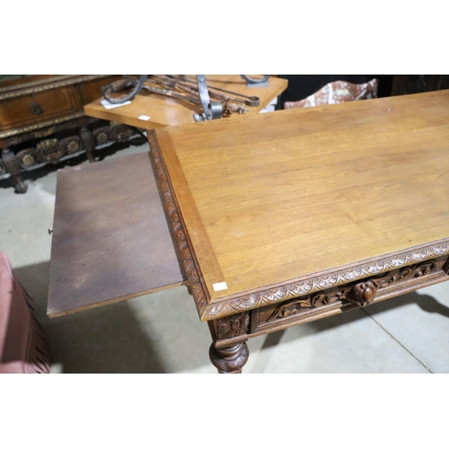 458 - Antique French Henri II oak two drawer desk, standing on turned fluted legs, approx 77cm H x 128cm W... 