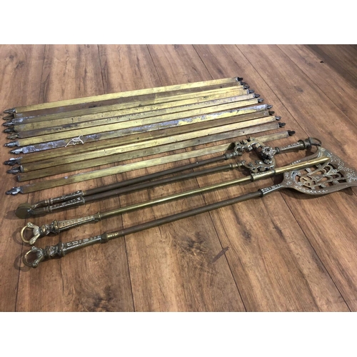 126 - Vintage brass stair rods and fire tools