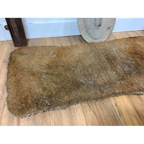 155 - Large cast iron fire surround with horse hair rug