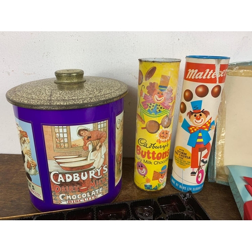 219 - Vintage chocolate and sweets containers with board game etc