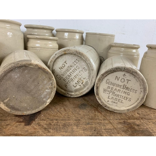 220 - Quantity of vintage stone jars, 2 with Hartley's label