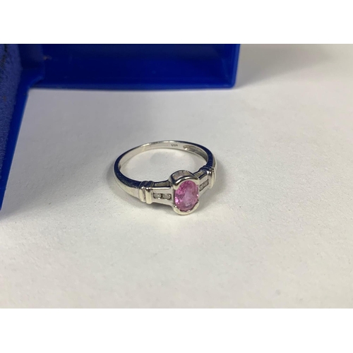 255 - 9ct white gold diamond and pink gem ring