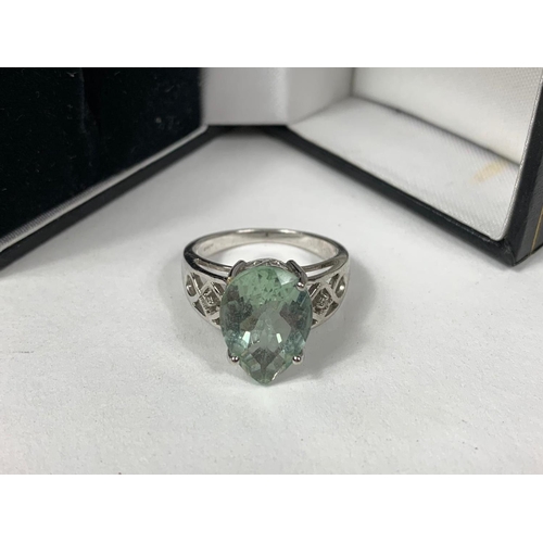 256 - 9ct white gold aqua stone ring, approx 5.1 grams