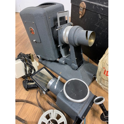 182 - Vintage projector and accessories with case