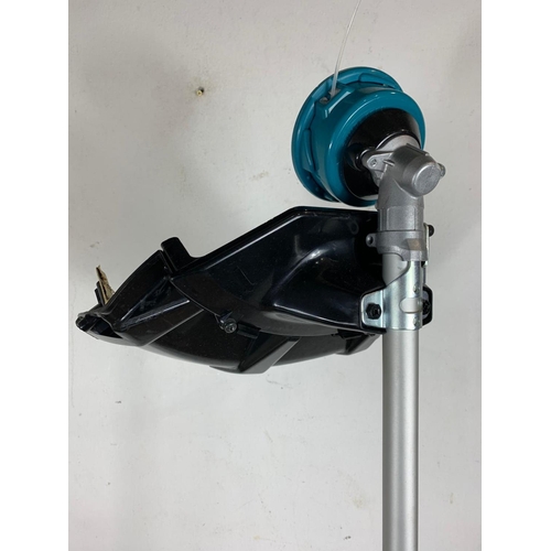 55 - Makita petrol strimmer