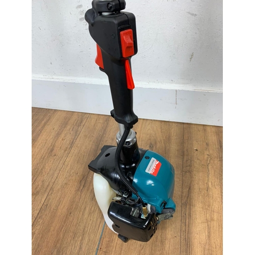 55 - Makita petrol strimmer