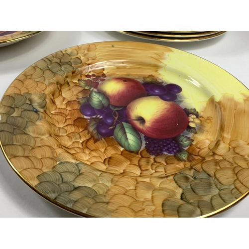 548 - Quantity of hand painted decorative plates platters and bowls