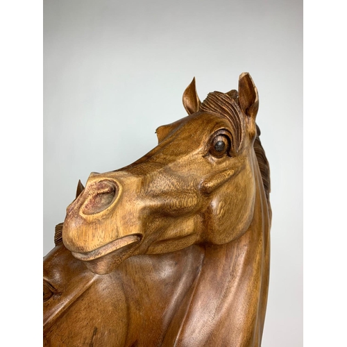 196 - Large carved wooden horse heads figure, 72cm