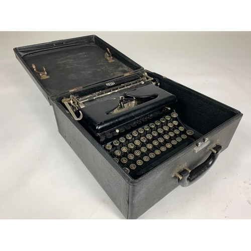 213 - Vintage typewriter in case