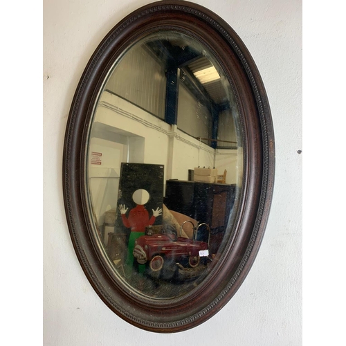 109 - Vintage oval bevelled mirror with 2 prints