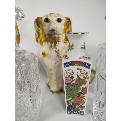 213 - Pair of pottery dogs, 5 crystal decanters and a pair of vases