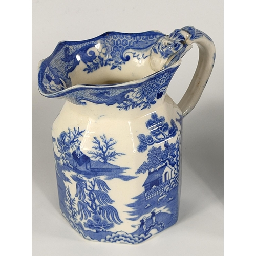 219 - Set of 3 Wedgewood jug.