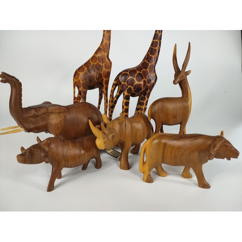 228 - Quantity of mid century teak animal ornaments.