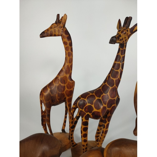 228 - Quantity of mid century teak animal ornaments.