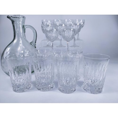 249 - Quantity of crystal glasses with jug