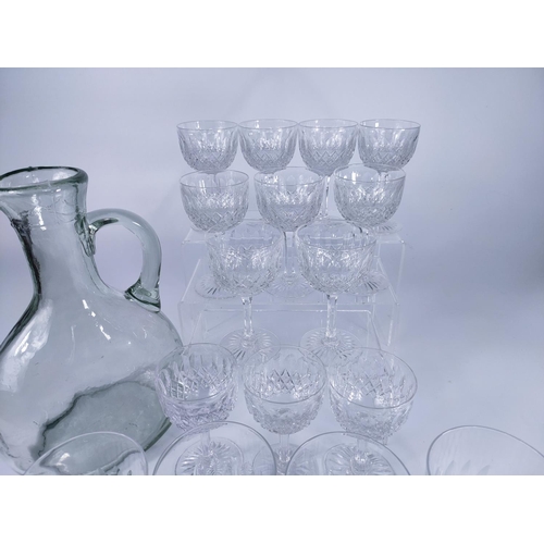 249 - Quantity of crystal glasses with jug