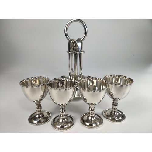 270 - Edwardian silver plate eggcup stand and spoons