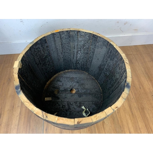 43 - Large wooden half barrel planter