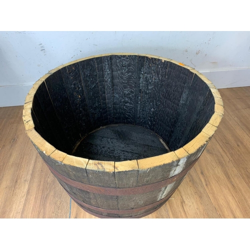 44 - Large wooden half barrel planter