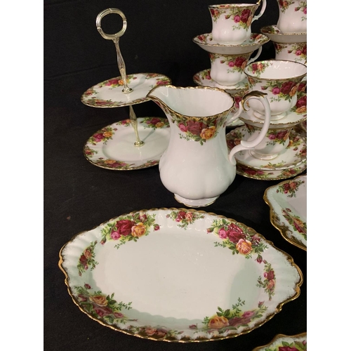 48 - Large quantity of Royal Albert Country Rose, tea and dinnerware