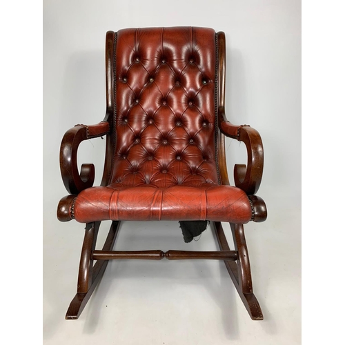 Victorian style mahogany and deep button ox blood leather rocking