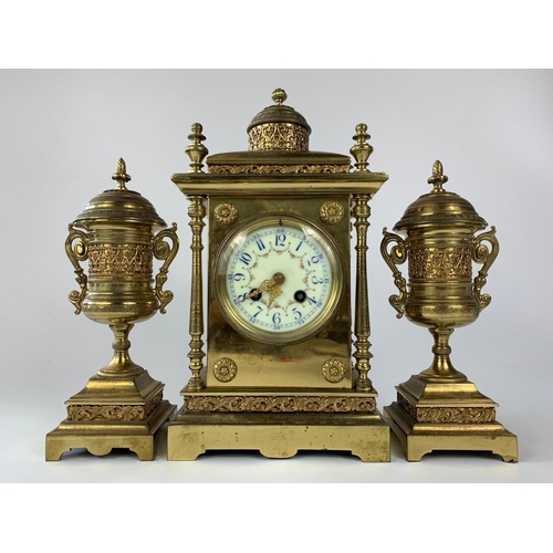 8 - Ornate 19th century French brass cased clock with garnitures, 33cm