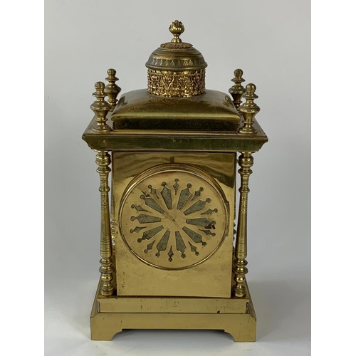 8 - Ornate 19th century French brass cased clock with garnitures, 33cm