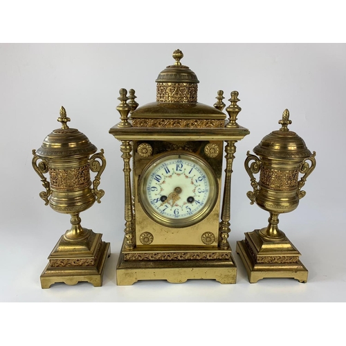 8 - Ornate 19th century French brass cased clock with garnitures, 33cm