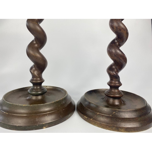 307 - Pair of heavy early 20th century bronze candlesticks, 35cm