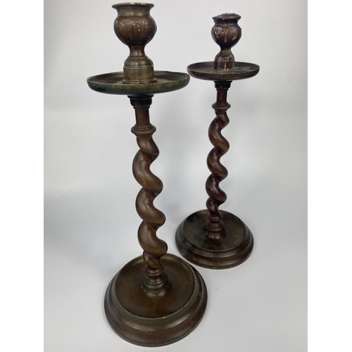 307 - Pair of heavy early 20th century bronze candlesticks, 35cm