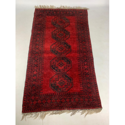 1010 - Middle Eastern hand knotted wool runner, 223cm x 119cm