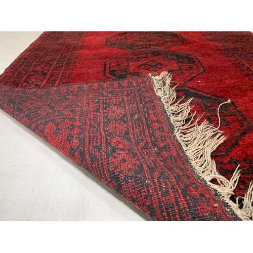 1010 - Middle Eastern hand knotted wool runner, 223cm x 119cm