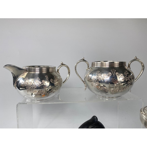 131 - 4pc silver plate tea service.