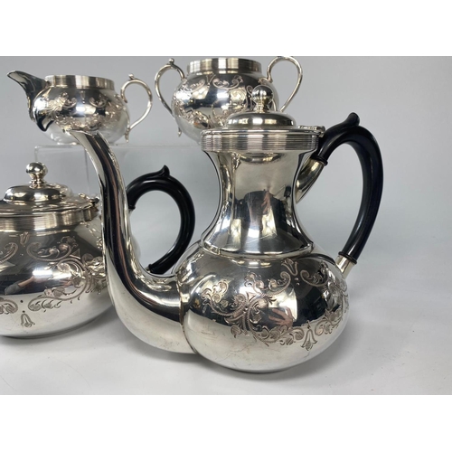 131 - 4pc silver plate tea service.