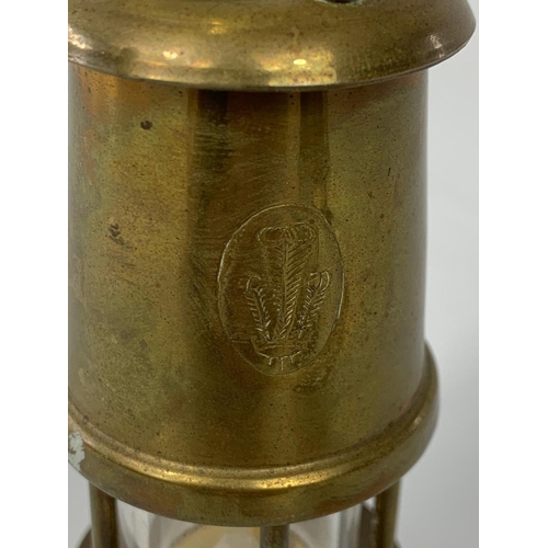 175 - Pair of small brass miner lamps with Prince of Wales feather stamp, 10cm