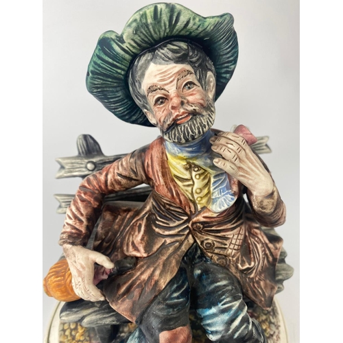 190 - Capodimonte figure, Tramp On a Bench. 26cm