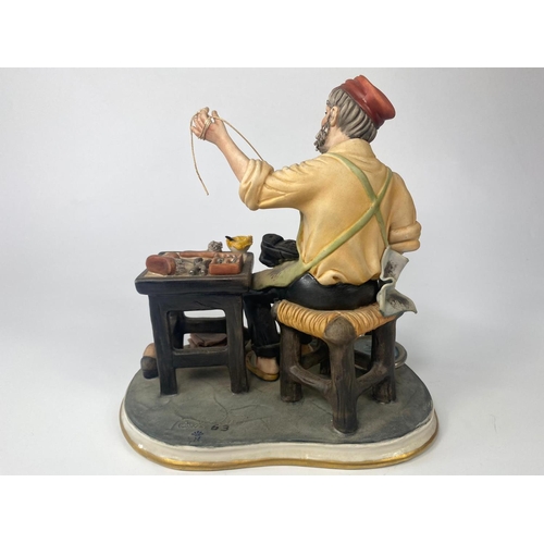 192 - Capodimonte figure, The Shoe Maker, 23cm x 22cm