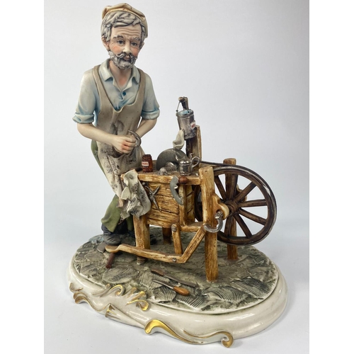 193 - Capodimonte figure, The knife Sharpener. 25cm